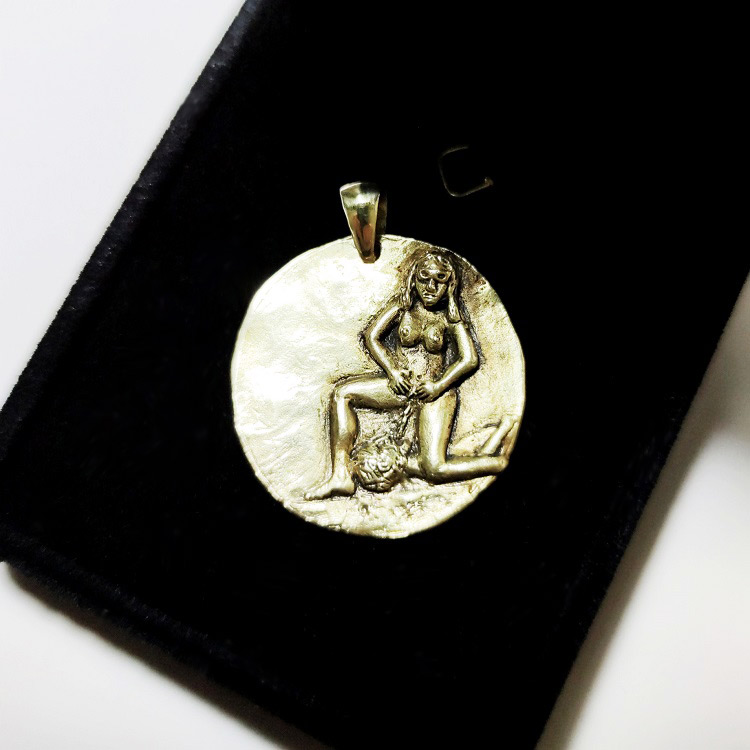 Pissing Woman Pendant