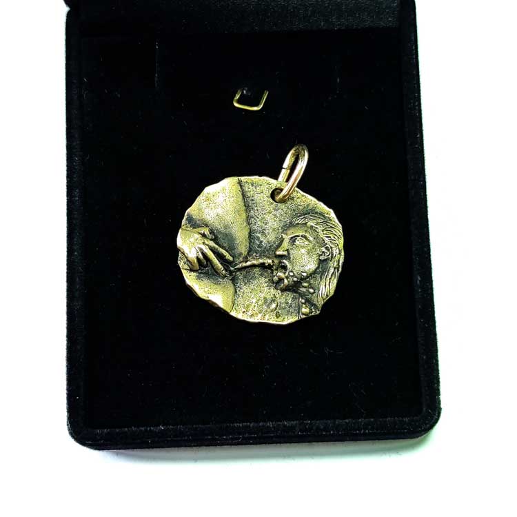 Pissing Girl Pendant
